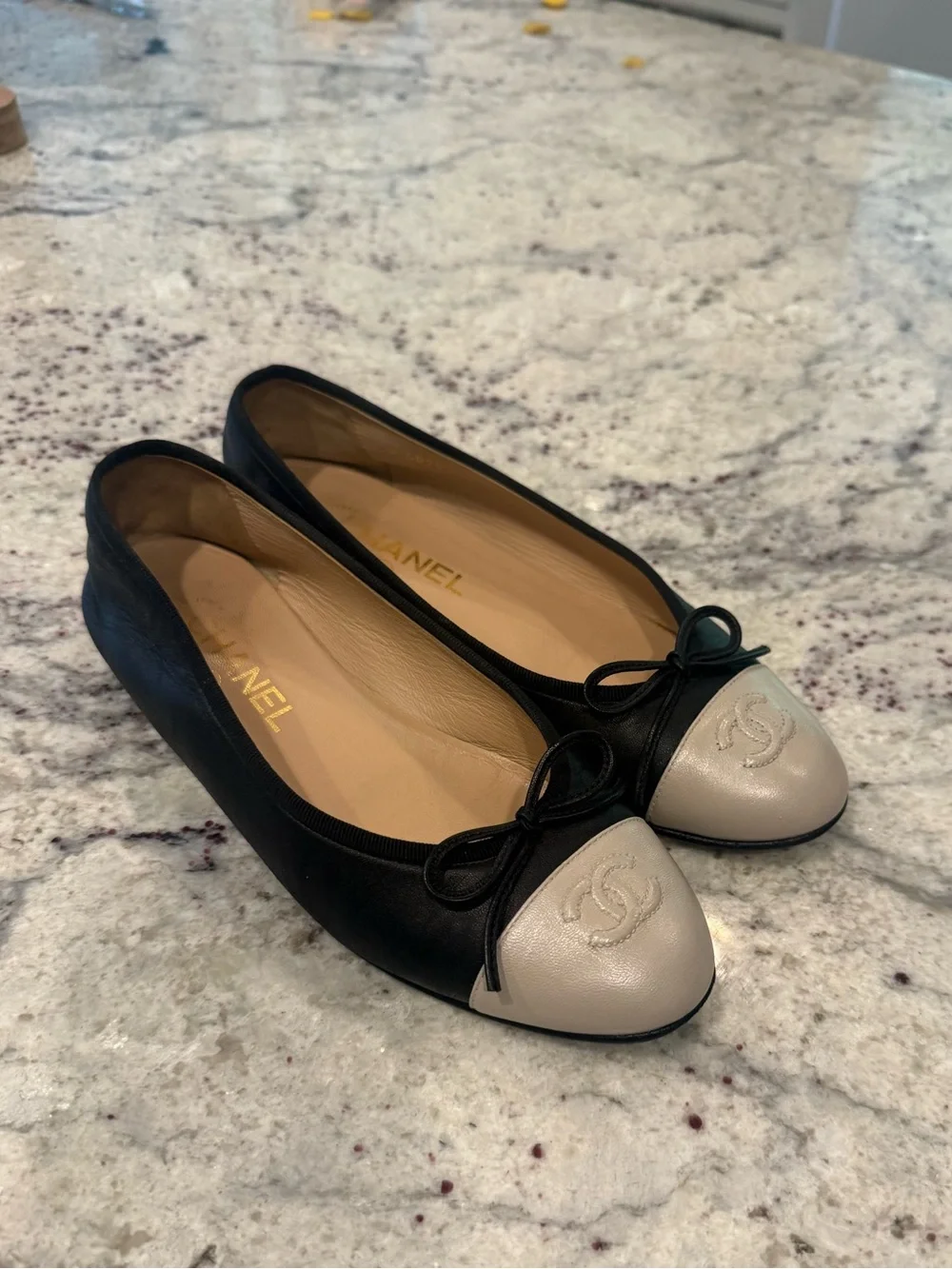 CHANEL Black Leather Ballet Flats with Cream Cap Toe size 7